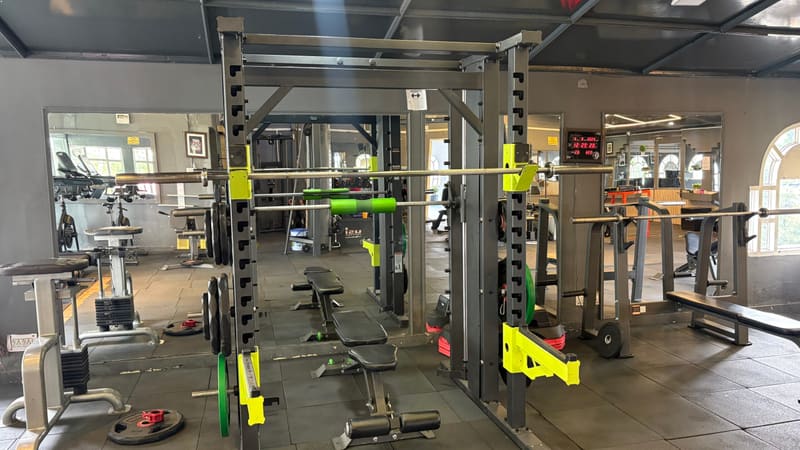 Dumbbell rack and free weights area at DA Fitness